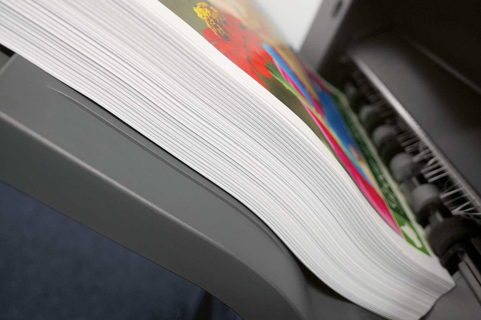 Printed sheets coming off a press